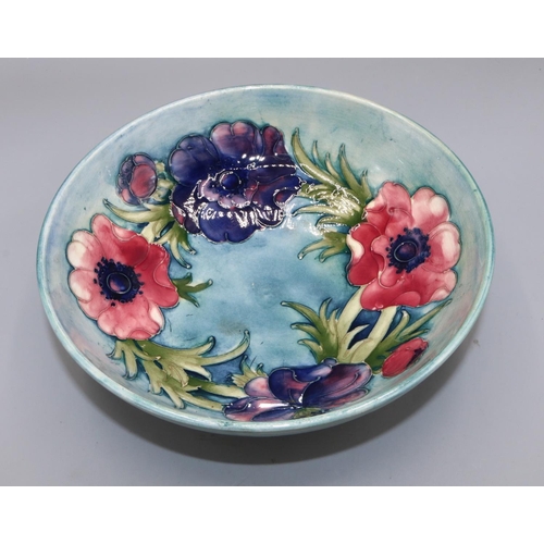 722 - Moorcroft Pottery, Anemone pattern bowl, pink and purple flowers on green wash ground, D22cm