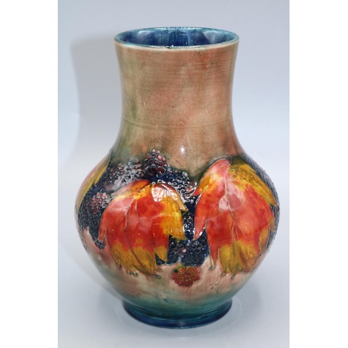 719 - Moorcroft Pottery, Flambe Leaves and Berries pattern vase, H18cm