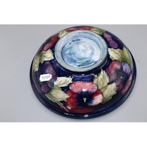 708 - Moorcroft Pottery, Pansies pattern bowl, red and purple flowers on dark blue ground, D20cm