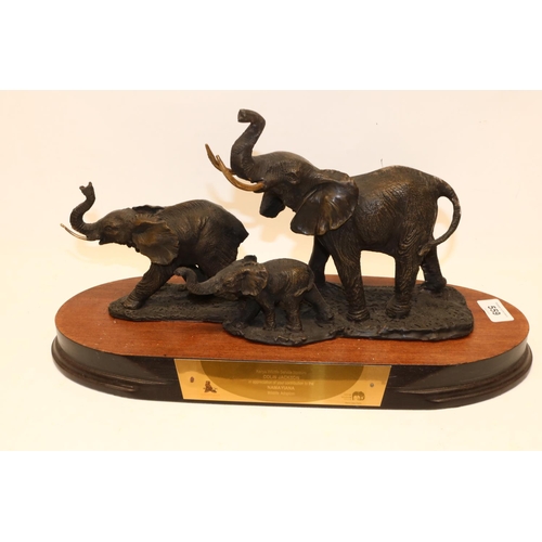 559 - Colin Jackson Collection: figure group of three elephants on wooden plinth, plaque inscribed 'Kenya ... 