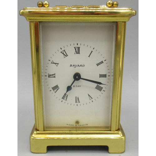 603 - Elliot 8 day walnut mantle timepiece on brass bun feet, brass bezel enclosing signed 3 1/2