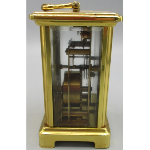 603 - Elliot 8 day walnut mantle timepiece on brass bun feet, brass bezel enclosing signed 3 1/2