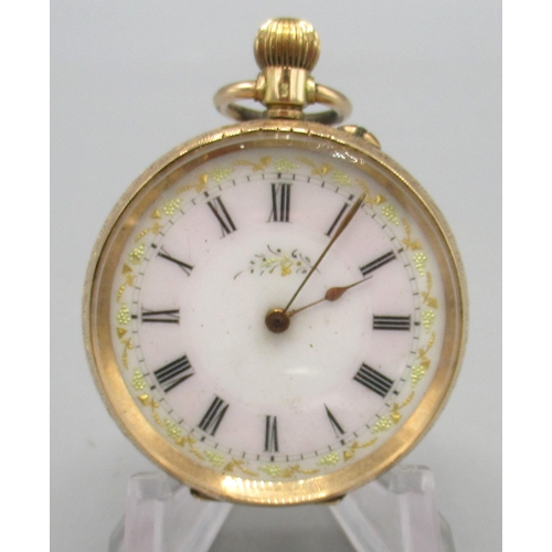 511 - Swiss 14ct gold keyless pin set fob watch, porcelain Roman dial with gilt highlights, bright cut cas... 