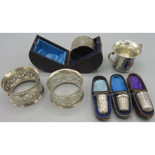 121 - George V silver cased napkin ring chased with swags and bows, vacant cartouche by Joseph Gloster Ltd... 