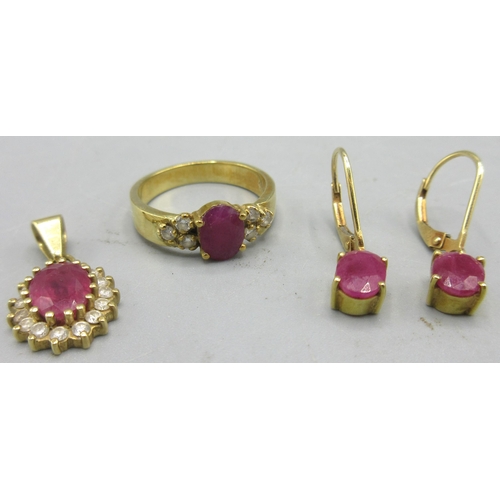 286 - 18ct yellow gold ring set with oval cut ruby flanked with three diamonds either side, size K, 18ct y... 