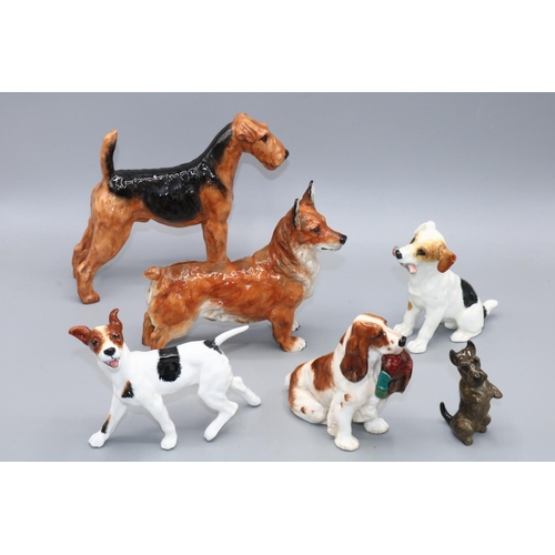 308 - Collection of six Royal Doulton figures of dogs, incl Corgi, terriers, etc. max. H13.5cm