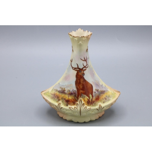 322 - Locke & Co., Worcester ivory blush triangular vase decorated with stag in moorland, signed W Stinton... 