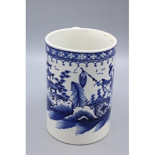 324 - English 18th century blue and white tankard decorated in Chinoiserie style, with a fisherman and pag... 