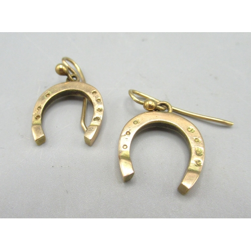 11 - Pair of 9ct yellow gold horseshoe drop earrings, stamped 375, 4.11g