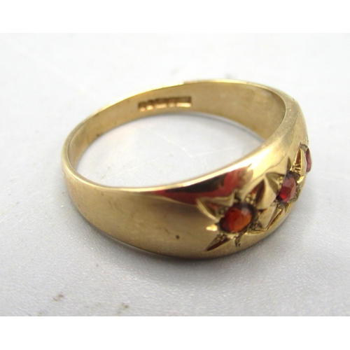 15 - 9ct yellow gold gypsy ring set with three rubies in star settings, size J1/2, and another similar ri... 