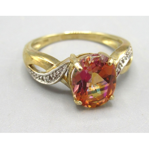 153 - 9ct yellow gold ring set with oval cut topaz on diamond chip shoulders, size N1/2, and a 9ct gold ri... 