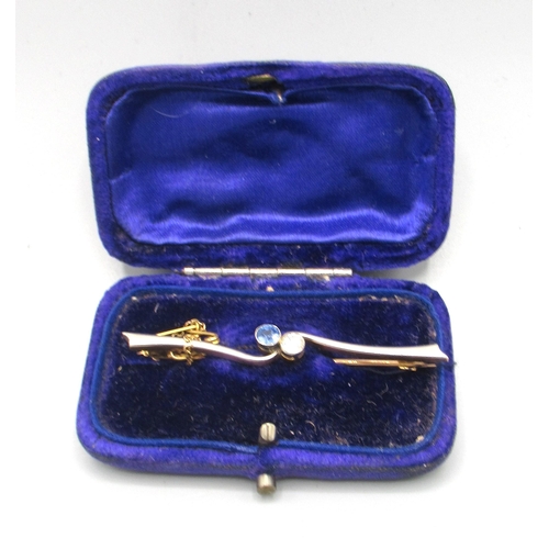 2 - Antique yellow and white metal bar brooch set with diamond and sapphire in twist setting, unmarked, ... 