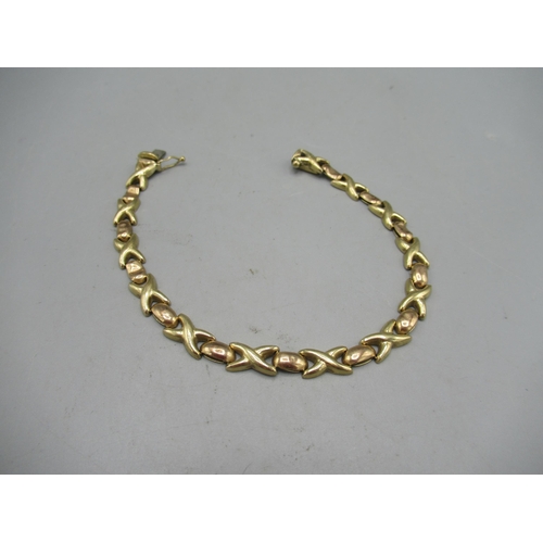 239 - 9ct yellow gold X link bracelet, with box closure, stamped 9kt, 6.32g, L19.5cm