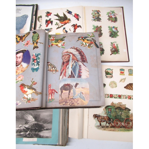 259 - Collection of early 20th century scrapbooks containing assorted prints, greetings cards, comic strip... 