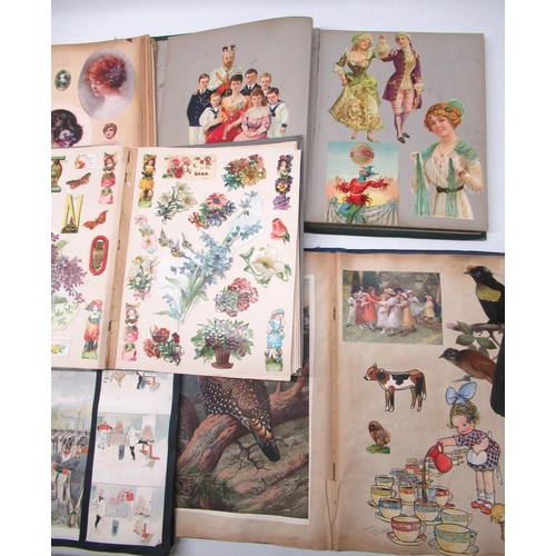 259 - Collection of early 20th century scrapbooks containing assorted prints, greetings cards, comic strip... 