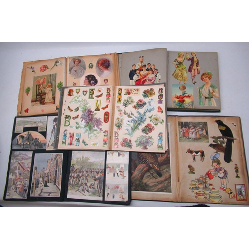 259 - Collection of early 20th century scrapbooks containing assorted prints, greetings cards, comic strip... 