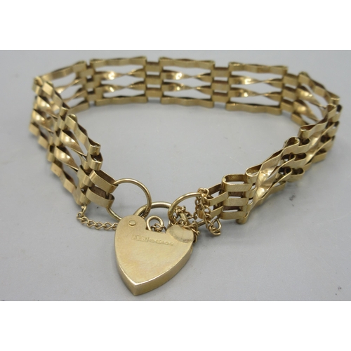 57 - 9ct yellow gold four bar gate bracelet with heart padlock and safety chain, stamped 375, D6cm ,9g