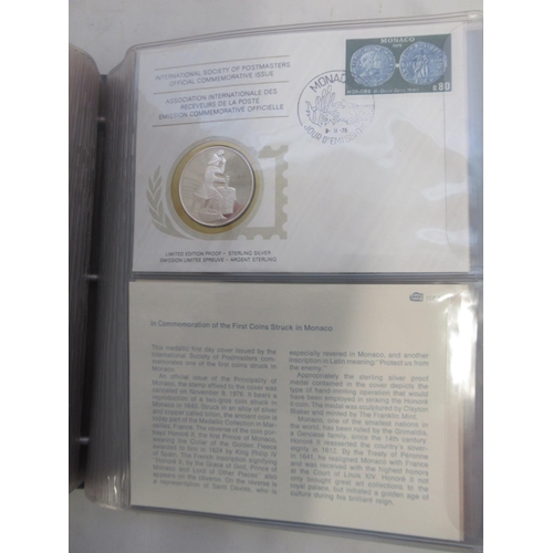 707 - International Society of Postmasters Official Commemorative Issues folder cont. 35 Silver proof coin... 