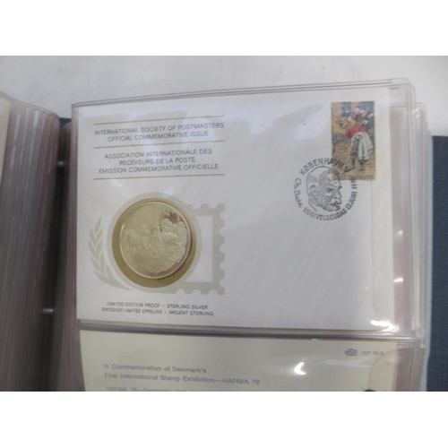 707 - International Society of Postmasters Official Commemorative Issues folder cont. 35 Silver proof coin... 