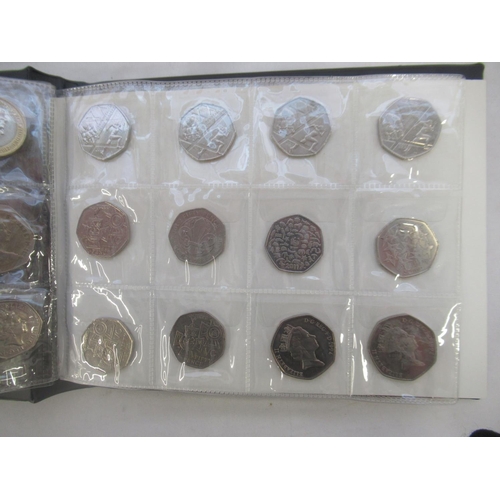 780 - Black coin folder cont. assortment of commemorative 50ps (111) £1s (2) and £2s (6) to inc. Olympics ... 