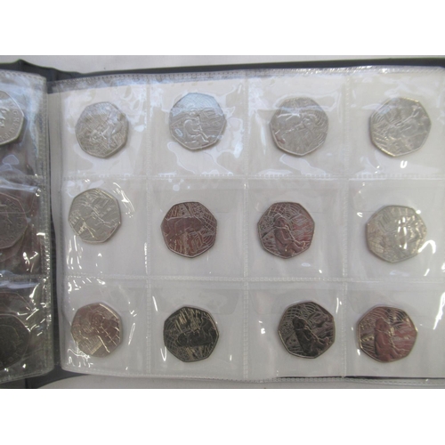 780 - Black coin folder cont. assortment of commemorative 50ps (111) £1s (2) and £2s (6) to inc. Olympics ... 