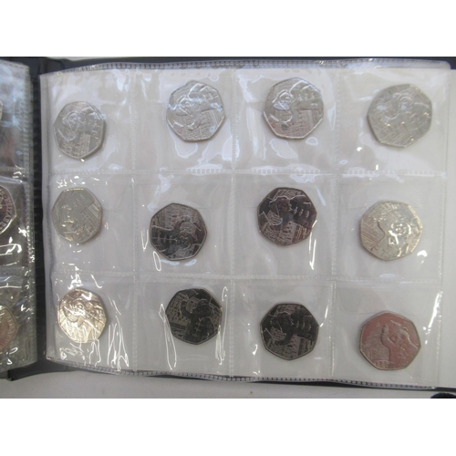 780 - Black coin folder cont. assortment of commemorative 50ps (111) £1s (2) and £2s (6) to inc. Olympics ... 