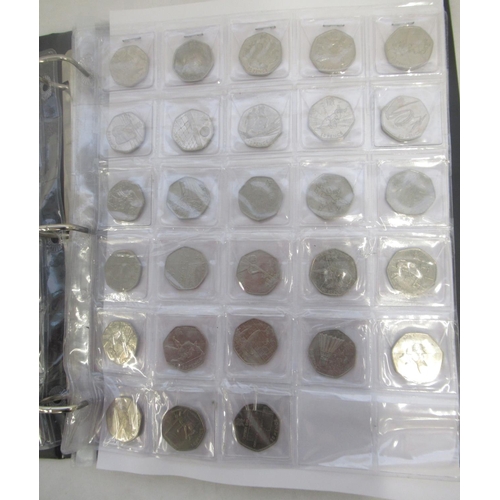 781 - Red coin folder and slip-case cont. collection of commemorative 50ps (90), 10ps (54) & £2s (33) to i... 