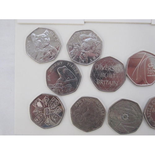 782 - Collection of 18 commemorative 50p's and a collection of Post-1947 5 shillings and other late c20th ... 