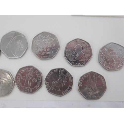 782 - Collection of 18 commemorative 50p's and a collection of Post-1947 5 shillings and other late c20th ... 