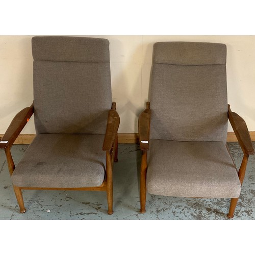 452 - Pair of mid-century teak framed reclining chairs arm  and a matching footstool, (3)