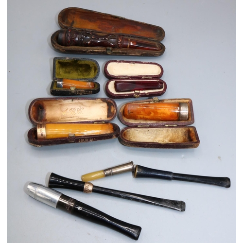 225 - Collection of cheroot holders, incl. one mounted in 15ct gold, silver mounted, etc. (9)