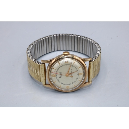 524 - Timor retailed by H.L. Brown & Sons Ltd, 9ct gold wristwatch on gold plated expanding bracelet, sign... 