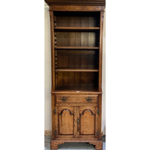 446 - Good quality George 111 style oak bookcase three adjustable shelves and drawer above two arched pane... 