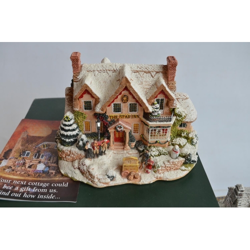 346 - Nine winter themed Lilliput Lane cottages to include The Star Inn, Chestnut Cottage, Hollytree House... 