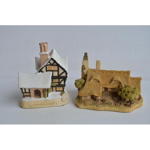 364 - Four boxed cottage models from David Winter to include Mr Fezziwig's Emporium (damage to chimney), O... 