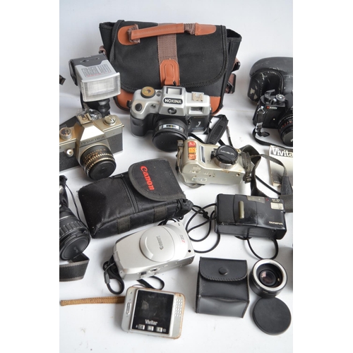 376 - Collection of 35mm film and early digital cameras to include Vivitar V3000s and Praktica SLR's with ... 