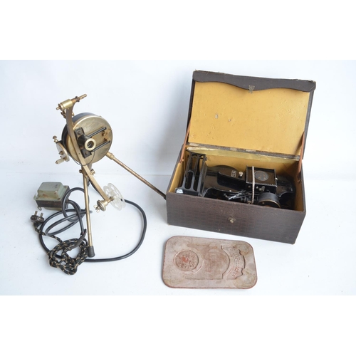 379 - Two vintage 9.5mm film projectors to include a Pathescope Princess and a cased Pathe Baby with a col... 