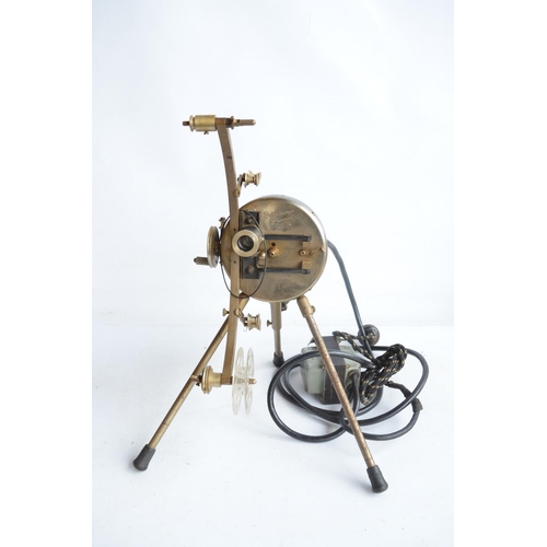 379 - Two vintage 9.5mm film projectors to include a Pathescope Princess and a cased Pathe Baby with a col... 