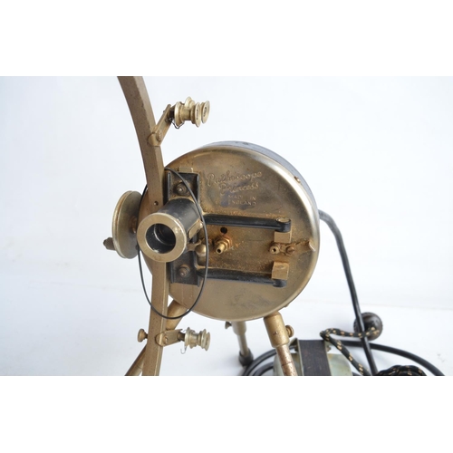 379 - Two vintage 9.5mm film projectors to include a Pathescope Princess and a cased Pathe Baby with a col... 