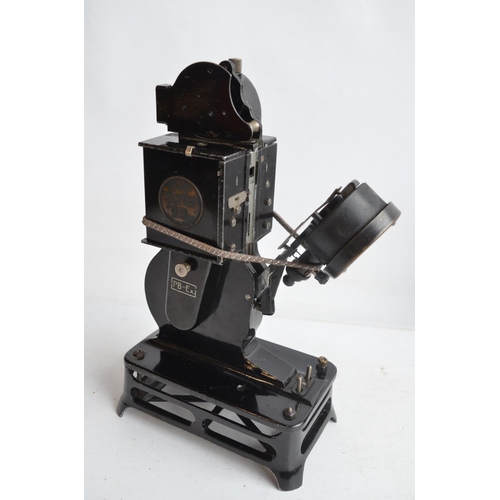 379 - Two vintage 9.5mm film projectors to include a Pathescope Princess and a cased Pathe Baby with a col... 