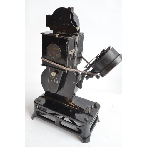 379 - Two vintage 9.5mm film projectors to include a Pathescope Princess and a cased Pathe Baby with a col... 