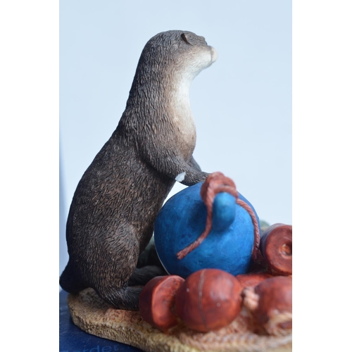 734 - Four boxed Otter sculptures from Border Fine Arts to include A1673 'Otter' (damaged/repaired, see ph... 