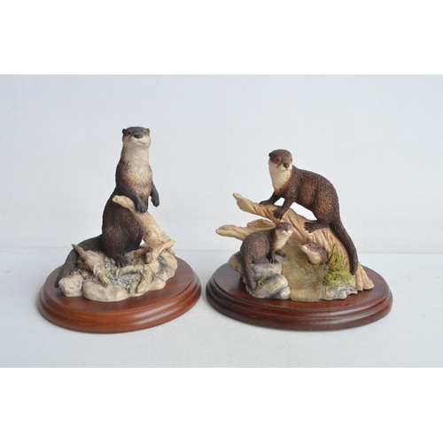 733 - Ten unboxed sculptures from Border Fine Arts, 9 Otter related to include large B0097 'Snow Slide' (W... 