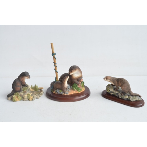 733 - Ten unboxed sculptures from Border Fine Arts, 9 Otter related to include large B0097 'Snow Slide' (W... 