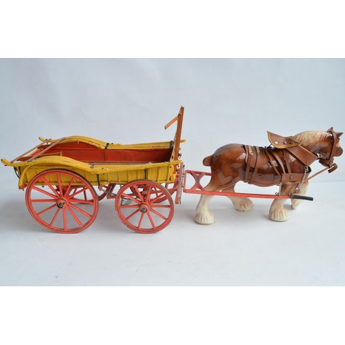 569 - Large ceramic shire horse and wooden cart model, no makers marks (overall length approx 89cm) and 2 ... 