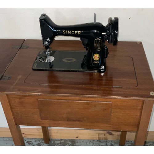 204 - Singer oak treadle operated sewing machine, H75cm and Singer electric sewing machine, H84cm (2)