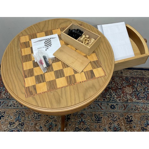 439 - Chess table with drawer on tripod base, with s set of wooden chess pieces and instructions, H70cm