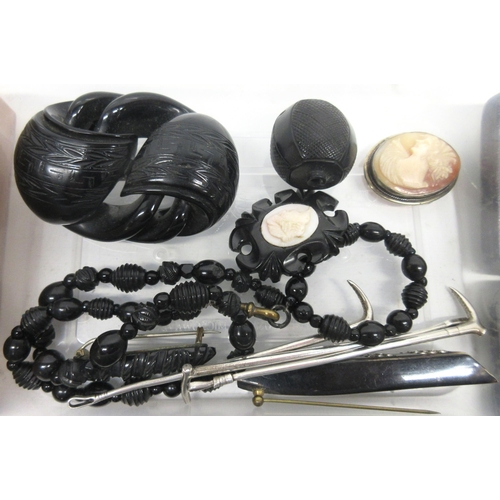 137 - Collection of Whitby jet jewellery incl brooches and necklace, Victorian style black evening bag, fo... 