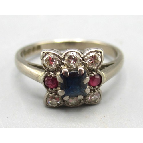 5 - 1970s 18ct white gold cluster ring set with central sapphire surrounded by a border of rubies and di... 