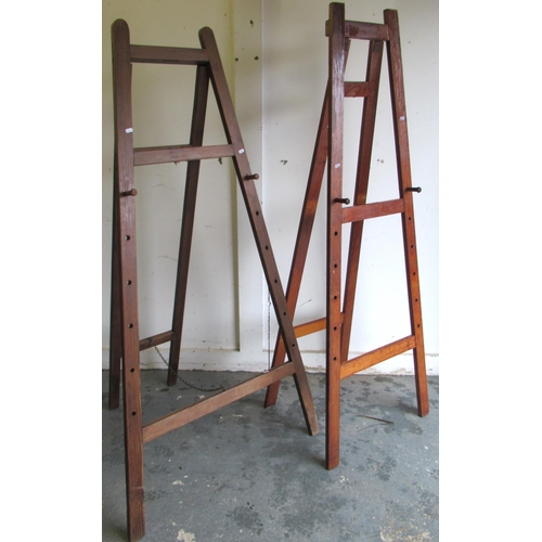 475 - Early 20th century waxed pine artist's easel and similar easel, max. H183cm (2)